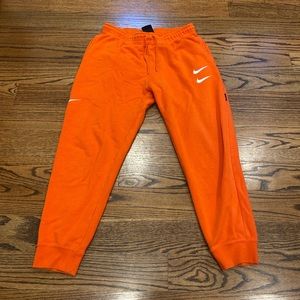 vintage orange nike sweatpants in size large!!